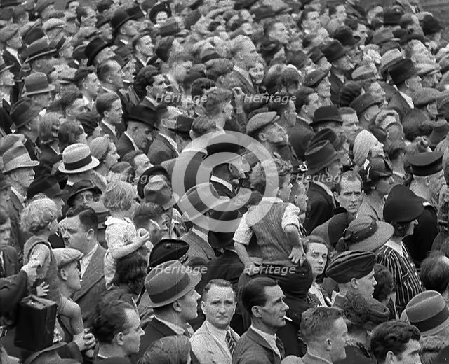 A Crowd watching a Military Band in Trafalgar Square, 1940.  Creator: British Pathe Ltd.