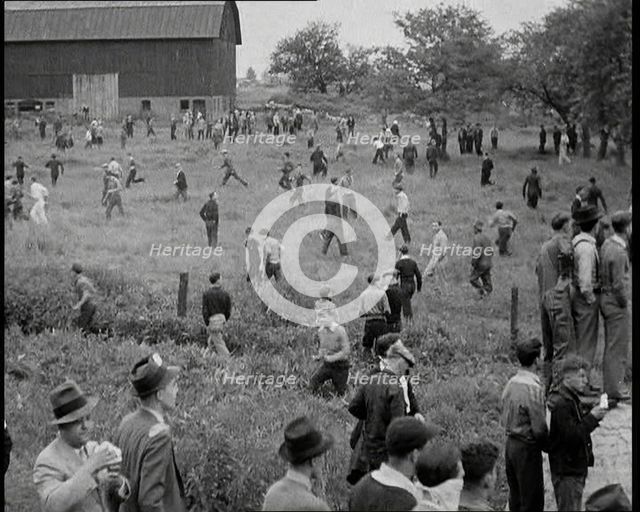 A Crowd of Angry Civilians Clashing With the US Army, 1932. Creator: British Pathe Ltd.