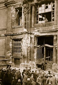 A crowd of men gathered in front of a ruined building, Germany c1918-c1919(?) (1936) Creator: Unknown