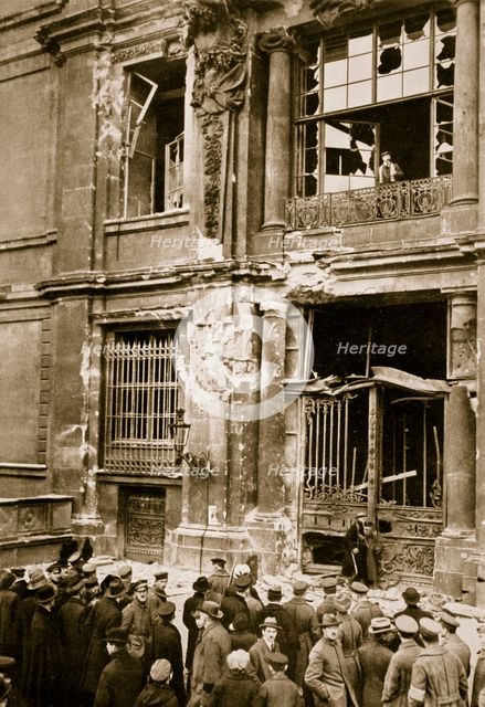 A crowd of men gathered in front of a ruined building, Germany c1918-c1919(?) (1936) Creator: Unknown.