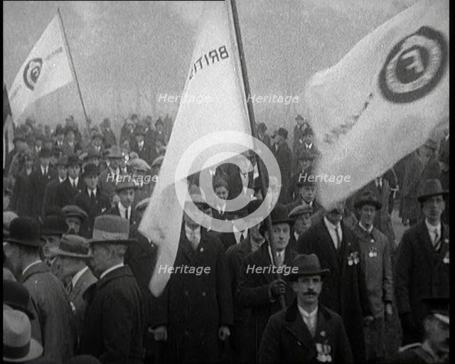 A Crowd of People Carrying Flags. Flags read  'British Fascists', 1924. Creator: British Pathe Ltd.
