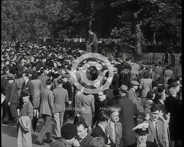 A Crowd of People at Speaker's Corner in Hyde Park, London, Listening to Two Men Speaking..., 1938. Creator: British Pathe Ltd.