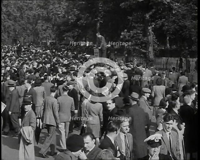 A Crowd of People at Speaker's Corner in Hyde Park, London, Listening to Two Men Speaking..., 1938. Creator: British Pathe Ltd.