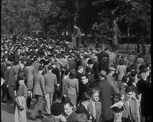 A Crowd of People at Speaker's Corner in Hyde Park, London, Listening to Two Men Speaking..., 1938. Creator: British Pathe Ltd
