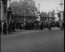 A Crowd of People Standing Outside Buckingham Palace as a New Government is Formed, 1924. Creator: British Pathe Ltd