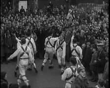 A Crowd of People Watching Morris Dancers Perform, 1931. Creator: British Pathe Ltd