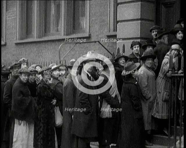 A Crowd of People Waiting an Unemployment Queue, 1924. Creator: British Pathe Ltd.