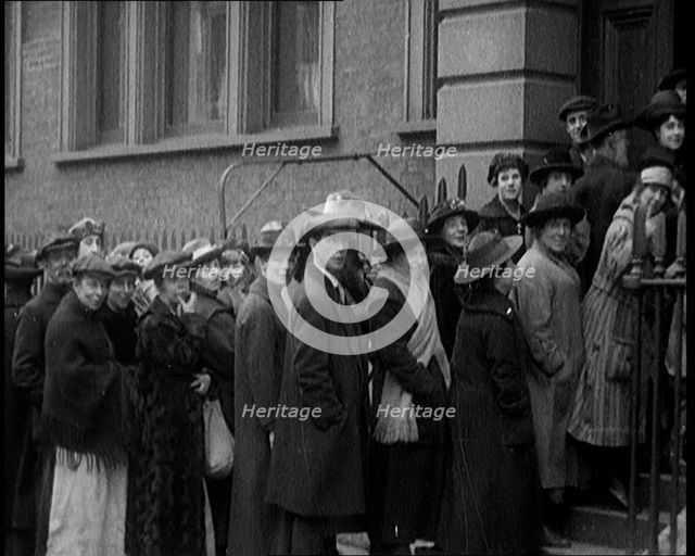 A Crowd of People Waiting an Unemployment Queue, 1924. Creator: British Pathe Ltd.