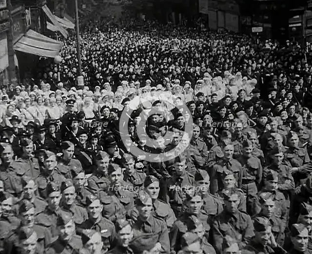 A Crowd of Soldiers Listening to a Speech by Lord Beaverbrook, Birmingham, 1942. Creator: British Pathe Ltd.