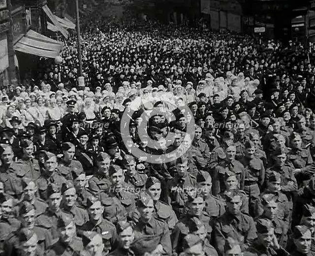 A Crowd of Soldiers Listening to a Speech by Lord Beaverbrook, Birmingham, 1942. Creator: British Pathe Ltd.