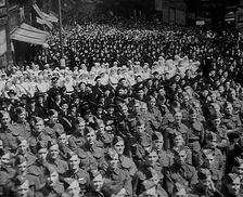 A Crowd of Soldiers Listening to a Speech by Lord Beaverbrook, Birmingham, 1942. Creator: British Pathe Ltd