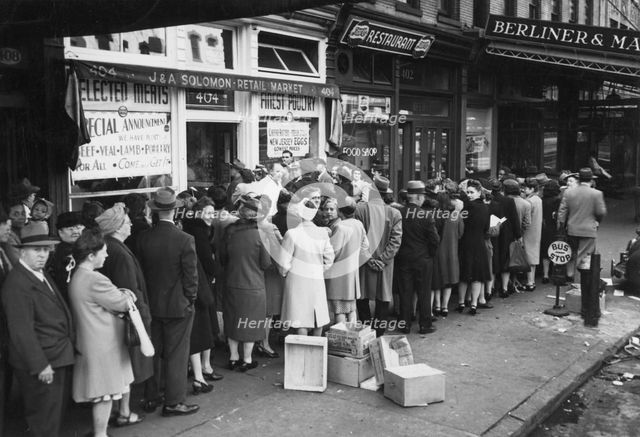 A crowd outside a meat market, New York, USA, 15th October, 1946.  Creator: Unknown.