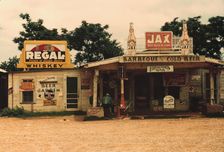 A cross roads store, bar, "juke joint," and gas...in the cotton plantation area, Melrose, La., 1940. Creator: Marion Post Wolcott