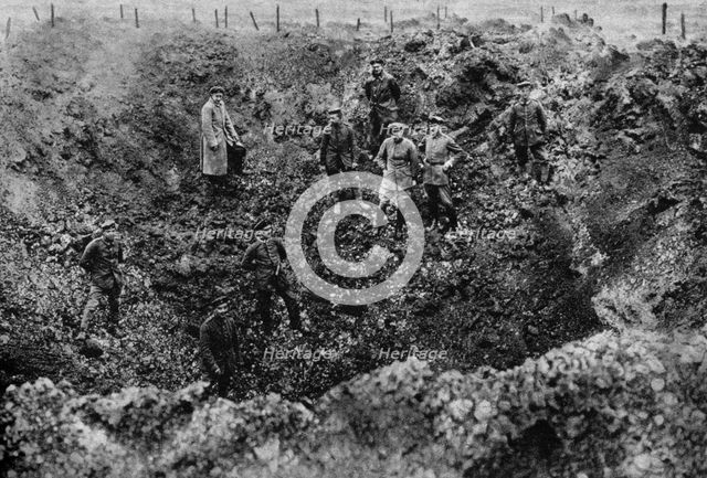 A crater caused by the explosion of a mine, Western Front, 1917. Artist: Unknown