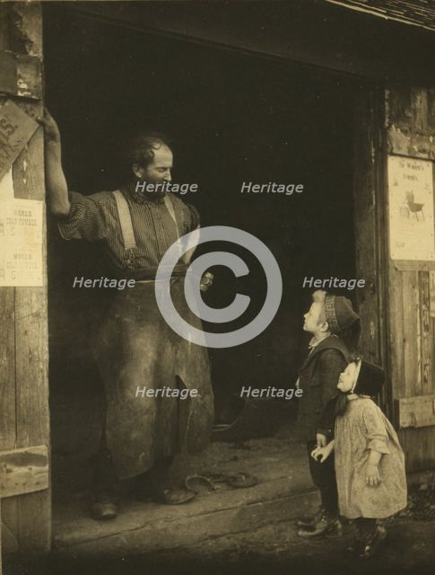 A "crack" with the blacksmith, c1900. Creator: Frances S. Allen.