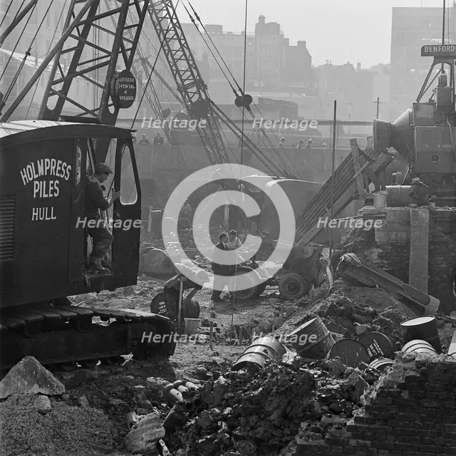 A crane at work on the post-war redevelopment of the Barbican Estate, London, 1962-1964. Creator: John Gay.