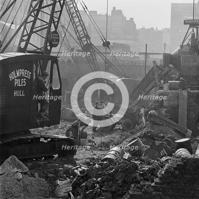 A crane at work on the post-war redevelopment of the Barbican Estate, London, 1962-1964. Creator: John Gay.