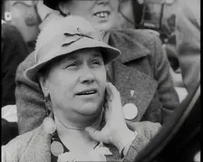 A Czech Woman in a Crowd in a Street Holding Her Left Hand up to Her Face, 1939. Creator: British Pathe Ltd