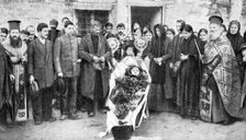 A dead Greek peasant lying in a coffin, 1922.Artist: HA Fawcett