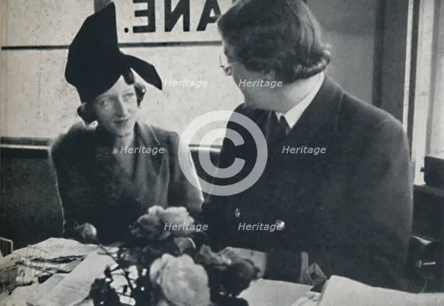 'A different hat soon', 1941. Artist: Cecil Beaton.