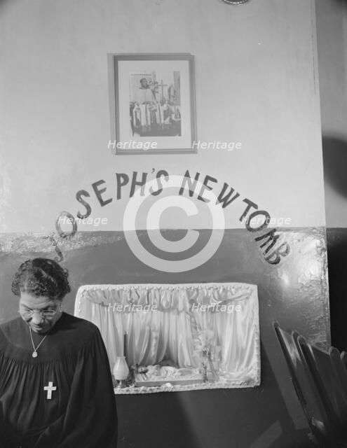 A disciple of the St. Martin's Spiritual Church keeping vigil at Saint..., Washington, D.C., 1942. Creator: Gordon Parks.