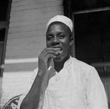 A dishwasher who works in a waterfront restaurant, Washington, D.C., 1942. Creator: Gordon Parks