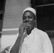 A dishwasher who works in a waterfront restaurant, Washington, D.C., 1942. Creator: Gordon Parks