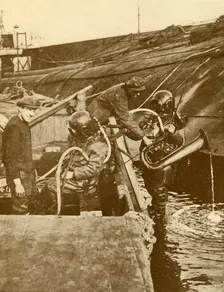 A Diver With Euphonium and Swords from the German "Kaiser" Scuttled at Scapa c1930. Creator: Unknown