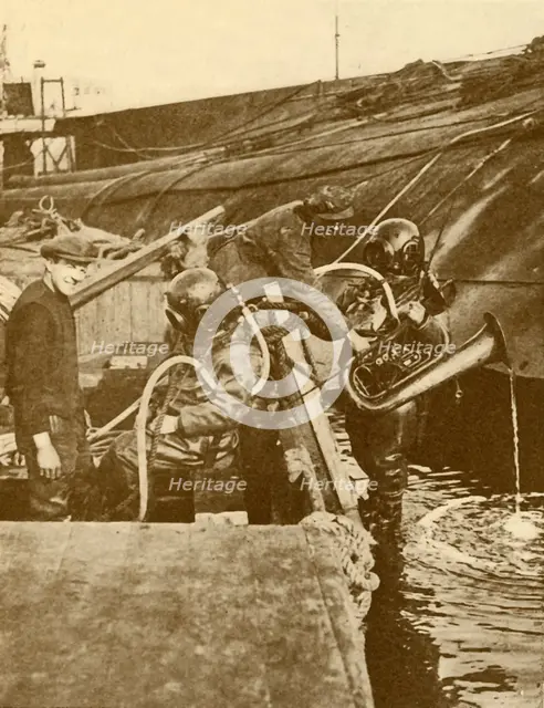 'A Diver With Euphonium and Swords from the German "Kaiser" Scuttled at Scapa', c1930. Creator: Unknown.