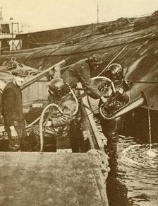 A Diver With Euphonium and Swords from the German "Kaiser" Scuttled at Scapa c1930. Creator: Unknown