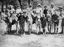 A donkey ride on a bank holiday on Hamstead Heath, London, 1926-1927