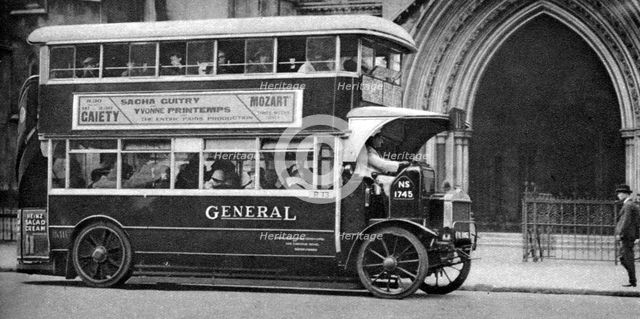 A double-decker bus standing outside the Law Courts, London, 1926-1927. Artist: Unknown