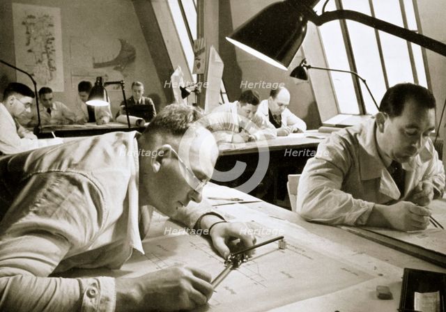 A drawing office scene, where new plans for fresh works are drawn up, Germany, 1936. Creator: Unknown.