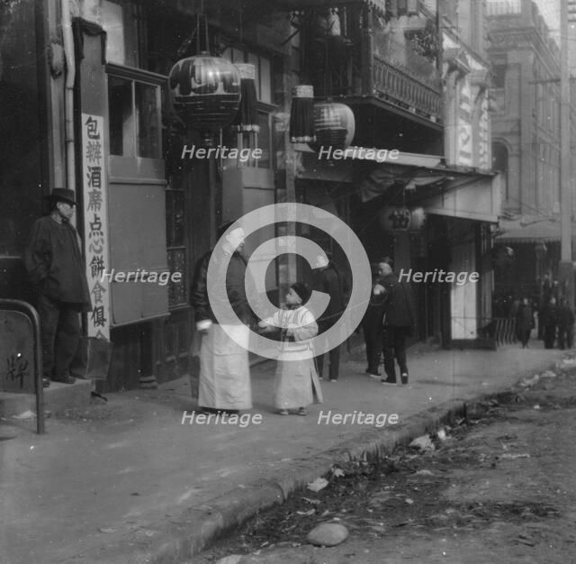 A family from the Consulate, Chinatown, San Francisco, between 1896 and 1906. Creator: Arnold Genthe.