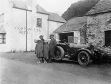 A family standing beside their car, Gorphwysfa Hotel, North Wales, c1920s-c1930s(?)