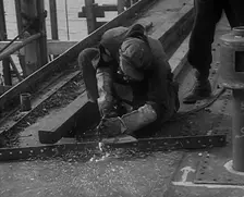 A Factory Worker Constructing Part of a Ship, 1943. Creator: British Pathe Ltd