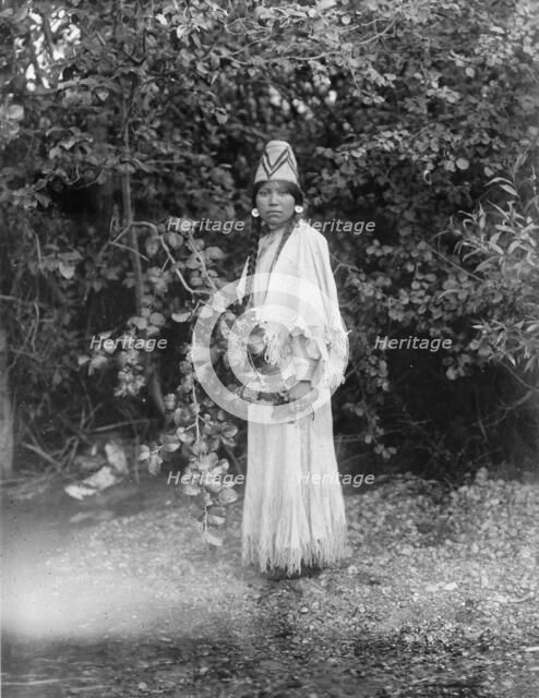 A fair maiden, c1905. Creator: Edward Sheriff Curtis.