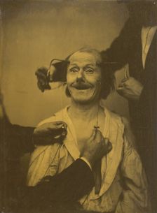 A false, incomplete expression of agreeable surprise, or admiration, 1854-1856, printed 1862. Creator: Duchenne de Boulogne