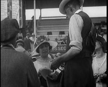 A Female Civilian Placing a Bet with a Bookie in a Horse Racing Event, 1920. Creator: British Pathe Ltd