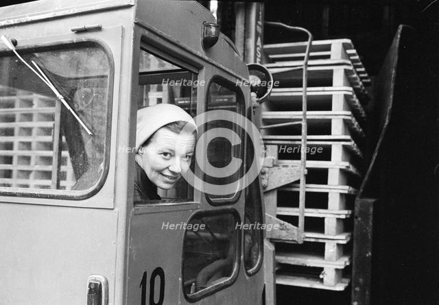 A female forklift truck driver, Landskrona, Sweden, 1967. Creator: Unknown.