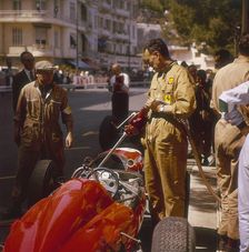 A Ferrari team member filling a car with fuel, Monaco Grand Prix, Monte Carlo, 1963