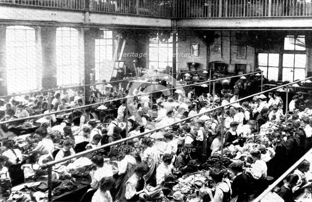 A few of seven hundred skilled work-people: a busy scene in one of the work-rooms, 1909. Creator: Unknown.