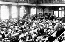 A few of seven hundred skilled work-people: a busy scene in one of the work-rooms, 1909. Creator: Unknown