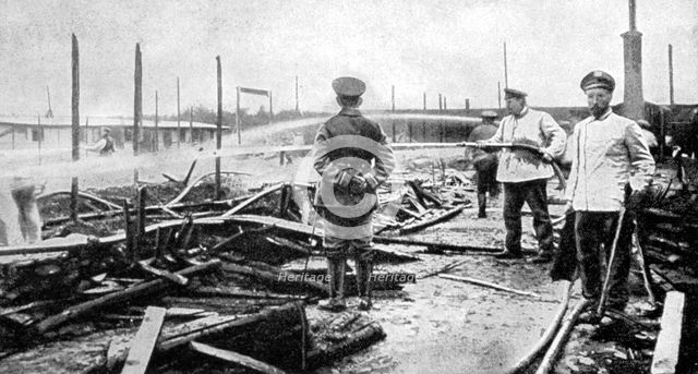 A fire damaged prison camp in Germany, World War I, 1915. Artist: Unknown