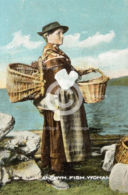 A fish woman from Llangwm, Pembrokeshire, c1900-1910. Creator: Unknown.