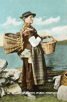 A fish woman from Llangwm, Pembrokeshire, c1900-1910. Creator: Unknown