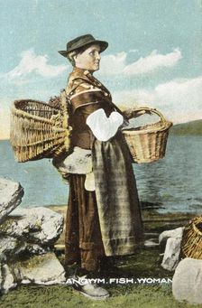 A fish woman from Llangwm, Pembrokeshire, c1900-1910. Creator: Unknown