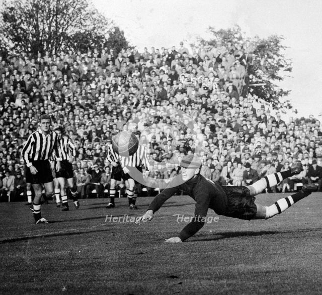 A football goalkeeper in action, Landskrona, Sweden, 1950s. Creator: Unknown.