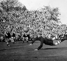 A football goalkeeper in action, Landskrona, Sweden, 1950s. Creator: Unknown