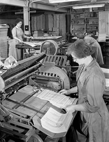A folding machine in a printworks, Mexborough, South Yorkshire, 1959. Creator: Michael Walters